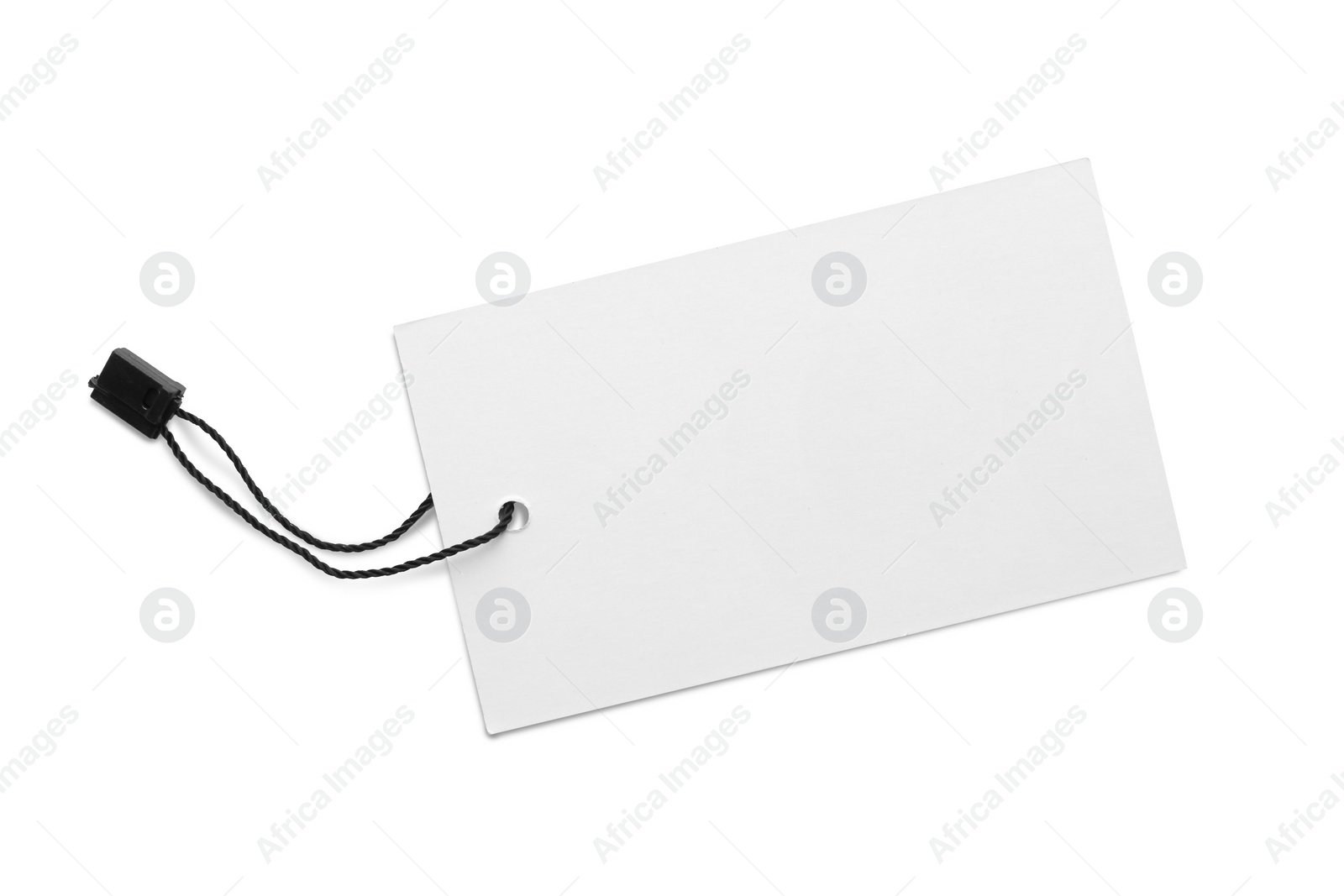 Photo of Blank tag on white background, top view. Space for text