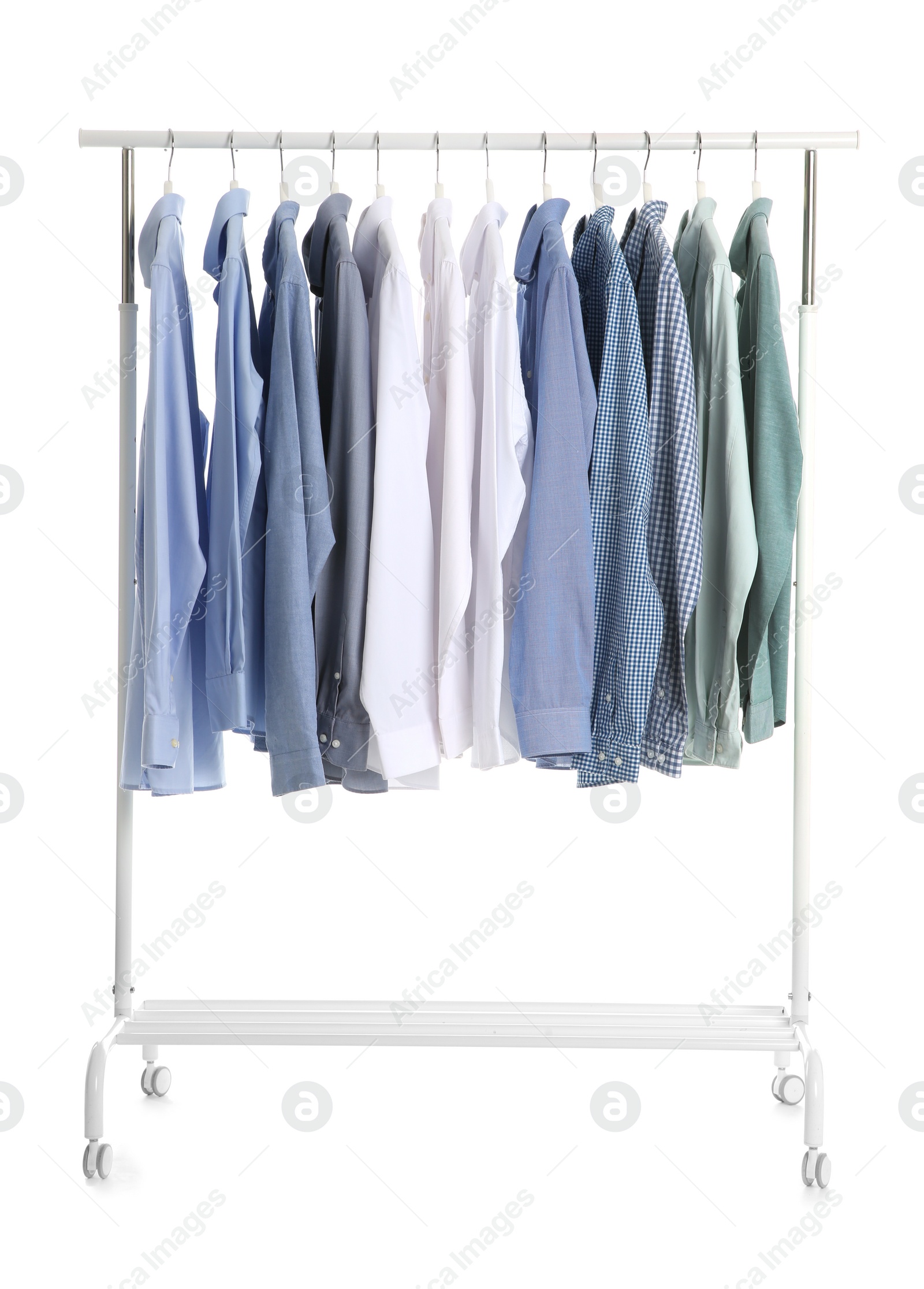 Photo of Wardrobe rack with men clothes on white background