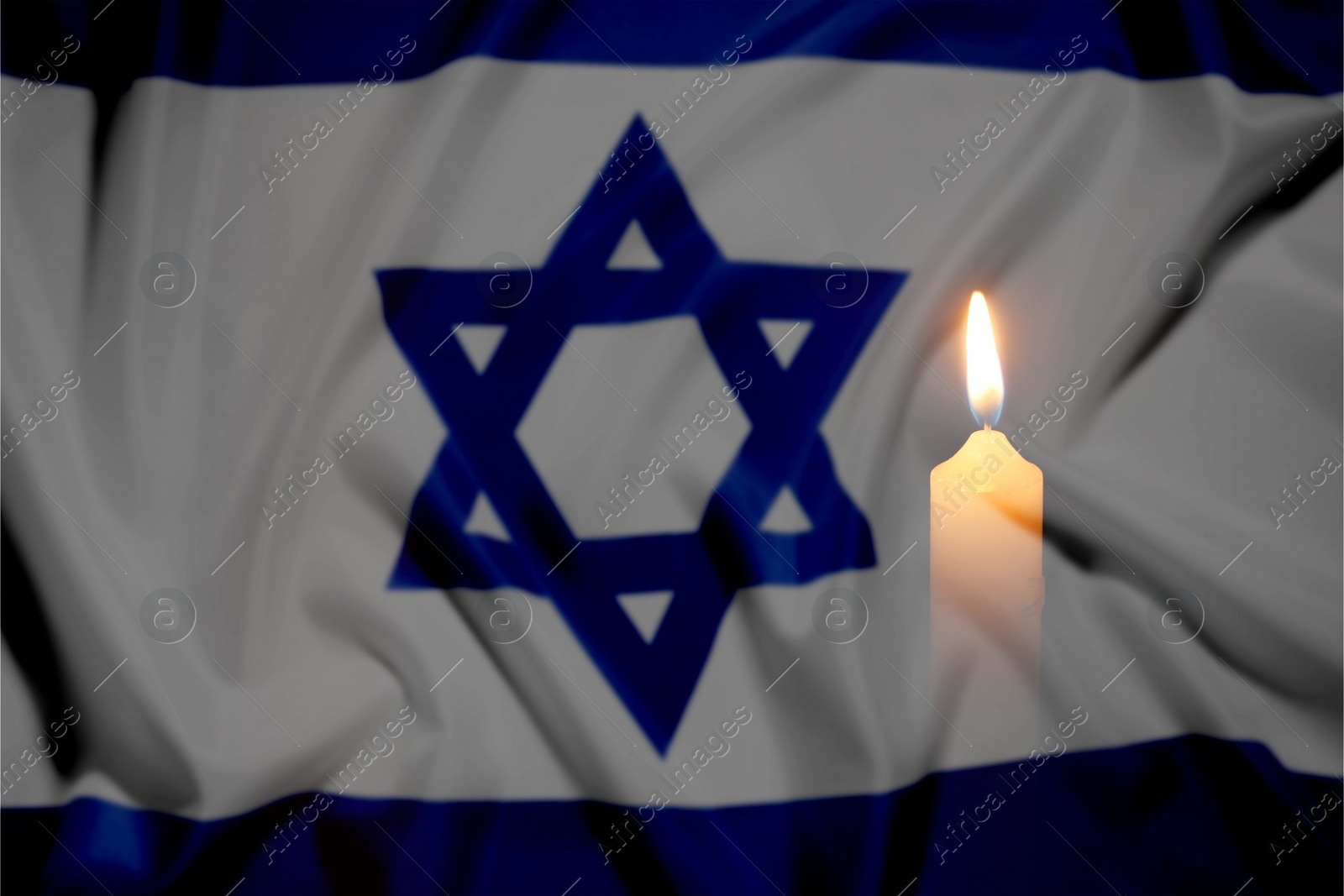 Image of Candle and flag of Israel, double exposure