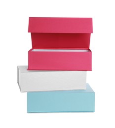 Photo of Stack of colorful shoe boxes on white background