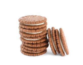 Photo of Tasty chocolate sandwich cookies with cream on white background