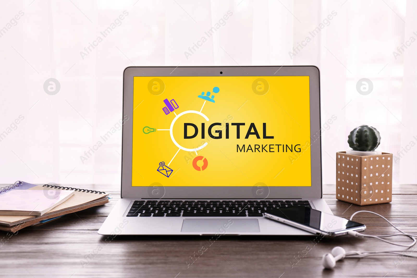 Digital marketing concept. Modern laptop on wooden table Image of Digital marketing concept. Modern laptop on wooden table