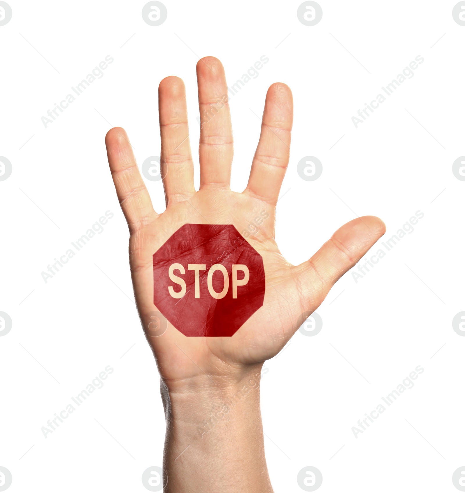 Image of Woman showing palm with drawn STOP sign on white background, closeup