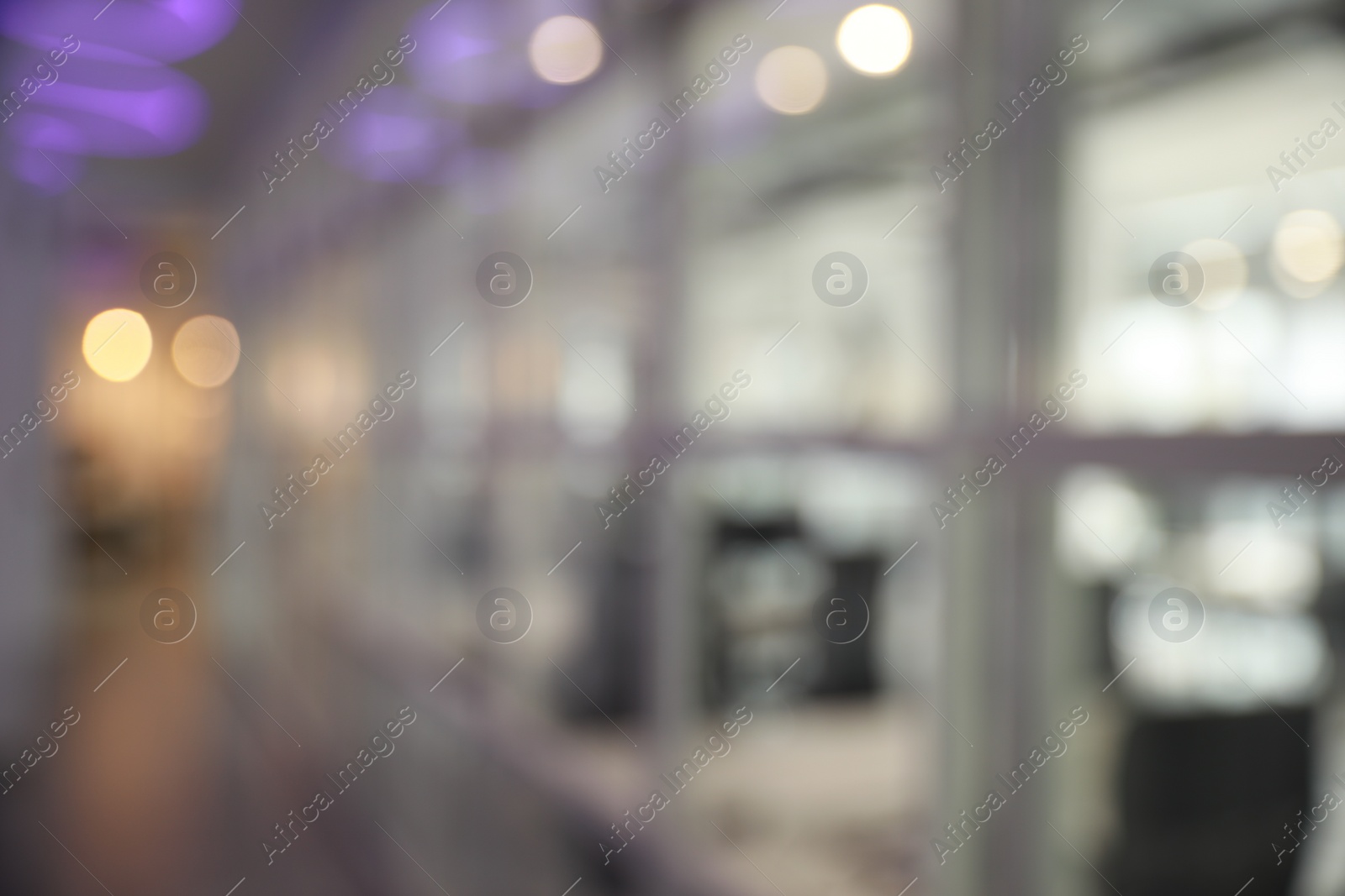 Photo of Blurred view of empty corridor in company
