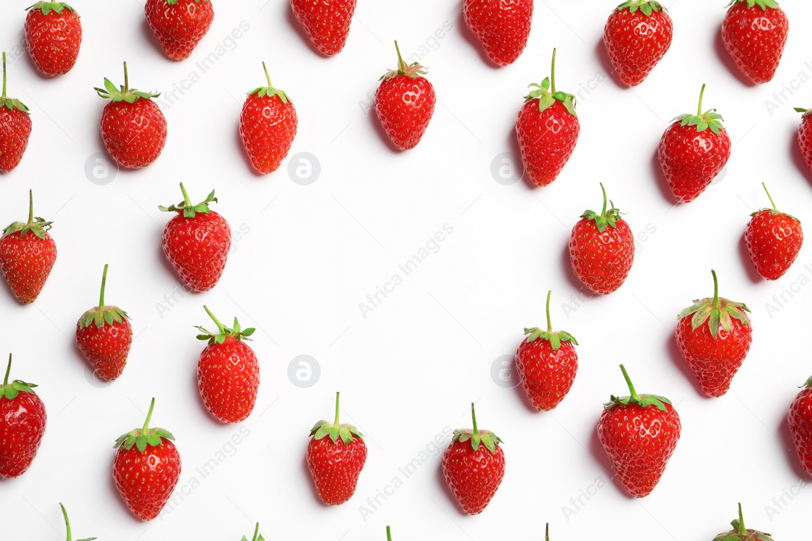 Photo of Flat lay composition with strawberries on light background