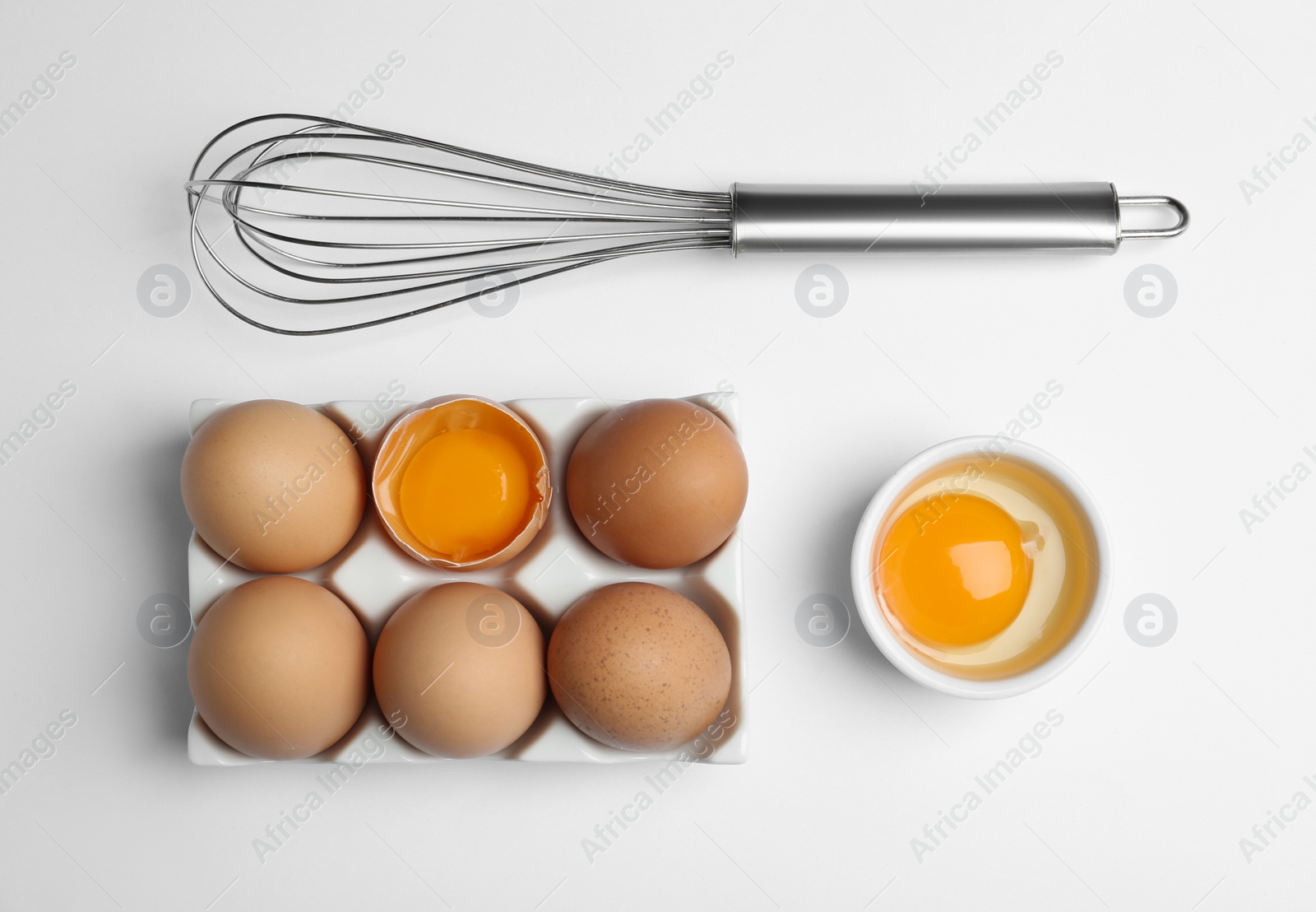 Photo of Flat lay composition with chicken eggs on white background