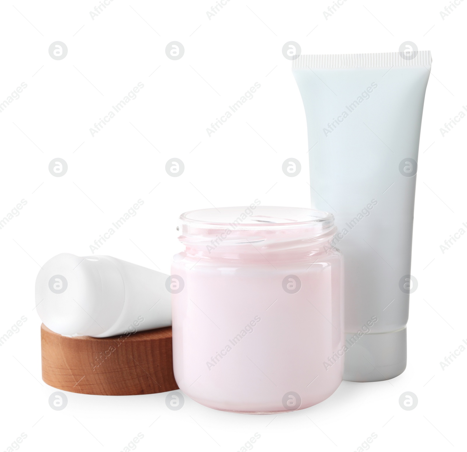 Photo of Jar and tubes of hand cream on white background