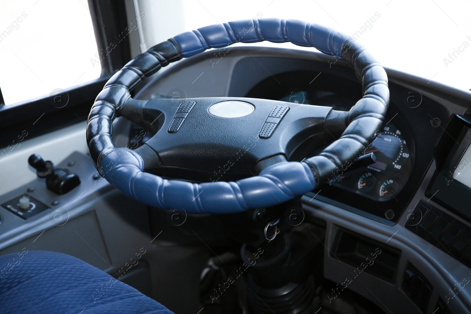 Photo of View of professional driver's cab in modern bus