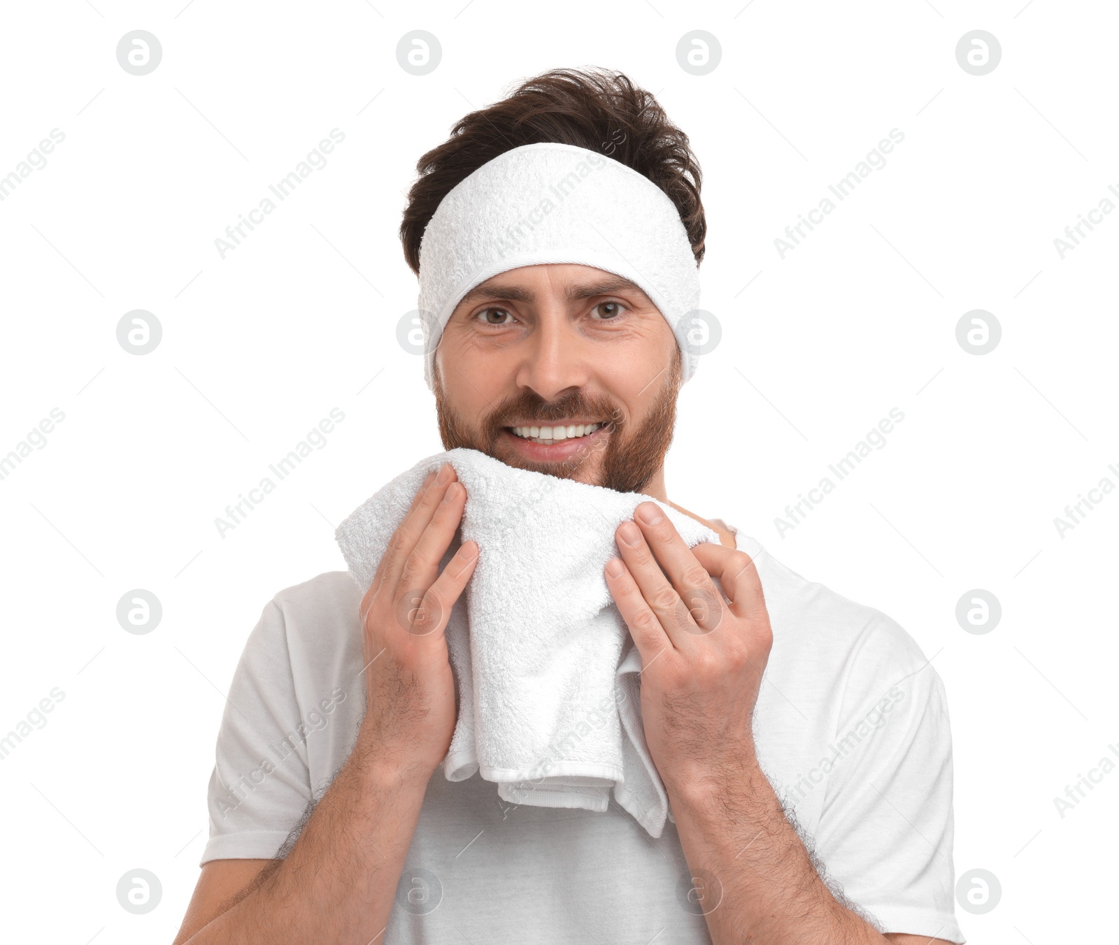 Photo of Washing face. Man with headband and towel on white background