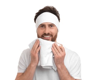 Washing face. Man with headband and towel on white background