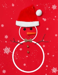 Image of Snowman with Santa hat and bow tie on red background, flat lay