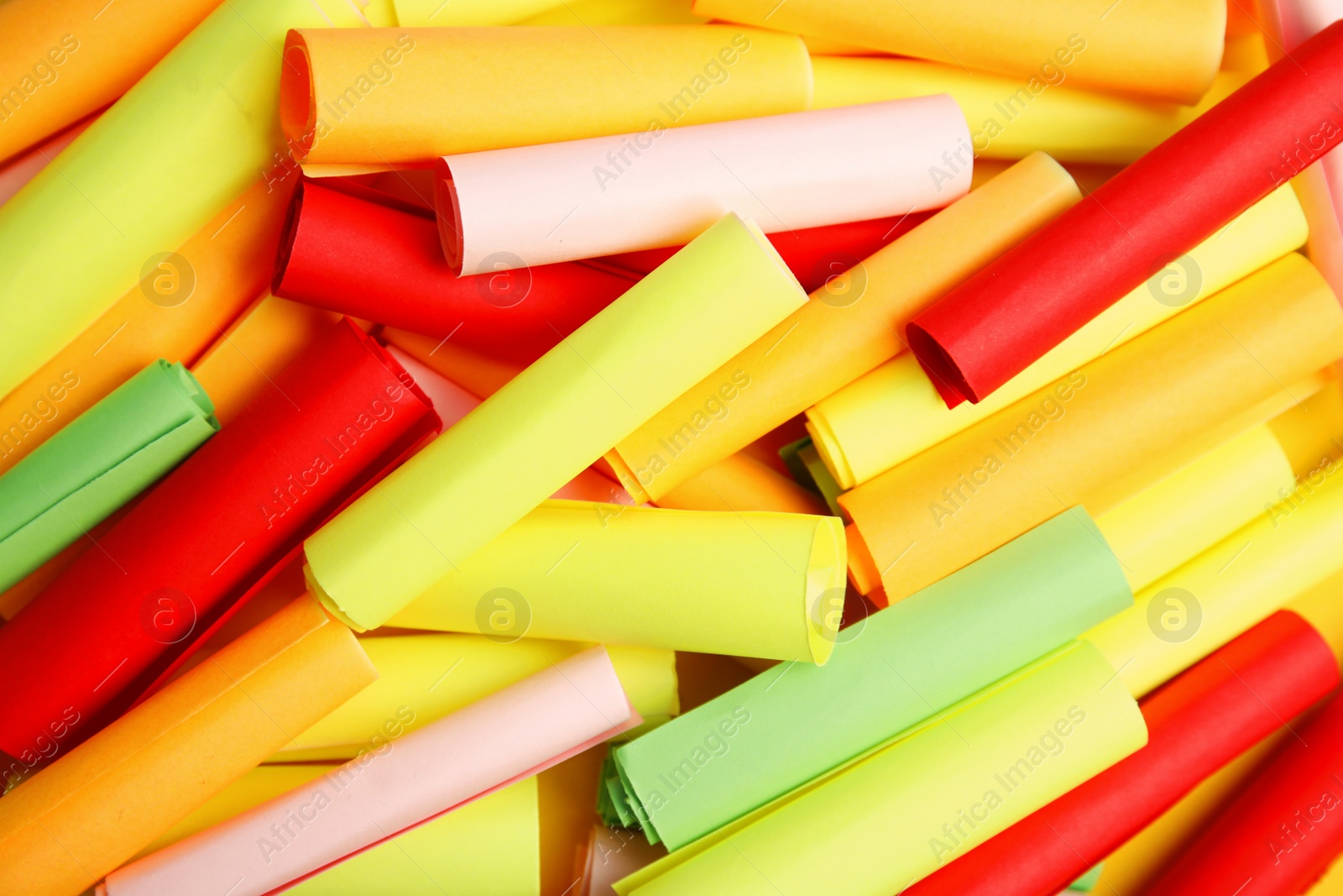 Photo of Pile of colorful paper pieces for lottery as background