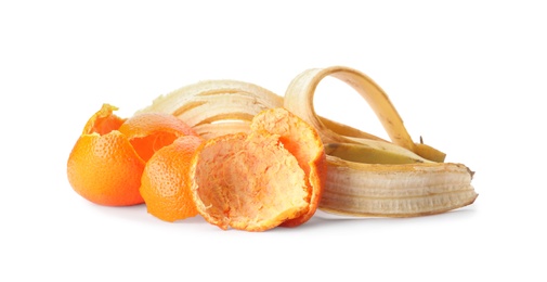 Banana and tangerine peel on white background. Composting of organic waste