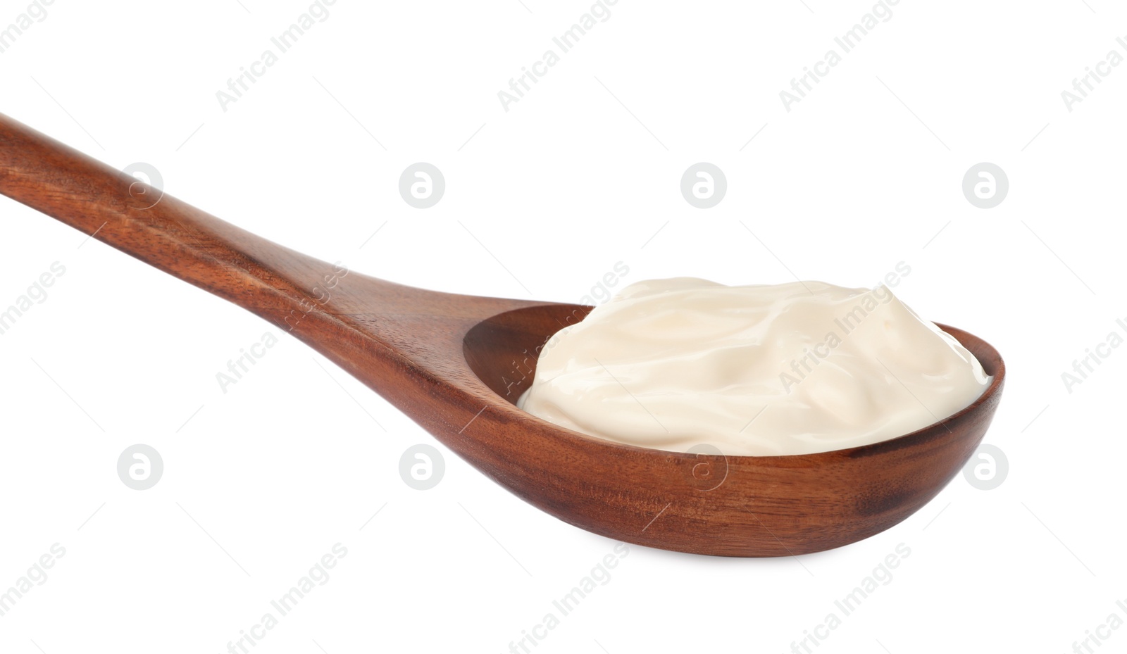 Photo of Wooden spoon with tasty mayonnaise isolated on white