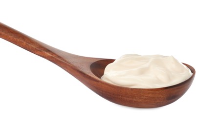 Wooden spoon with tasty mayonnaise isolated on white