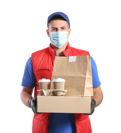 Photo of Courier in medical mask holding packages with takeaway food and drinks on white background. Delivery service during quarantine due to Covid-19 outbreak