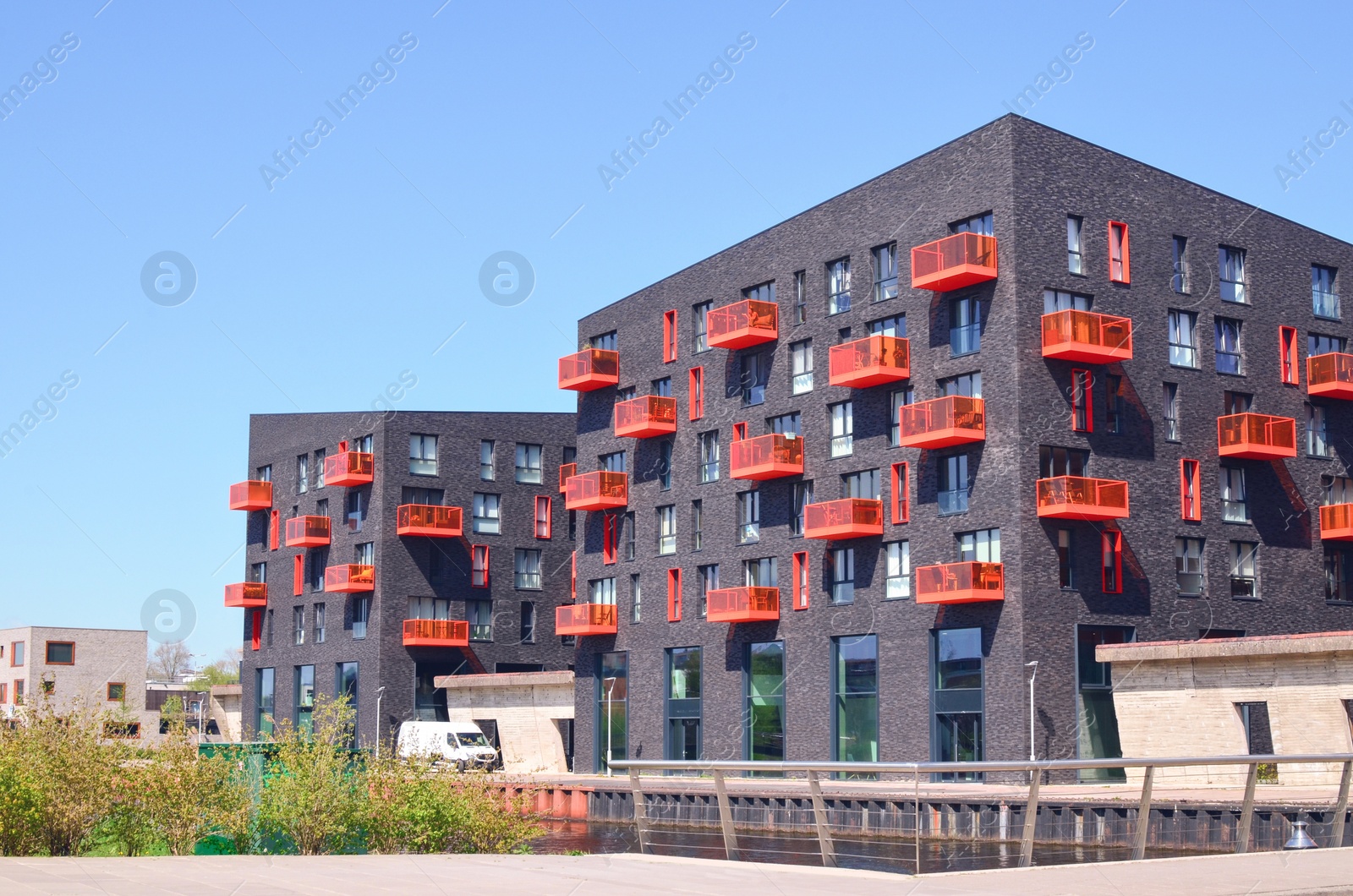 Photo of Exterior of beautiful modern residential complex on sunny day