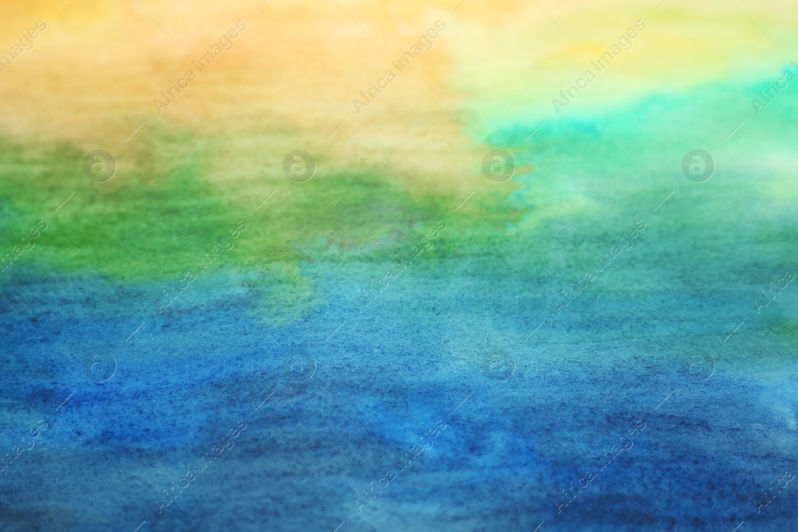 Photo of Abstract colorful background, closeup. Painted sheet of paper