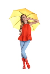 Photo of Woman with yellow umbrella on white background