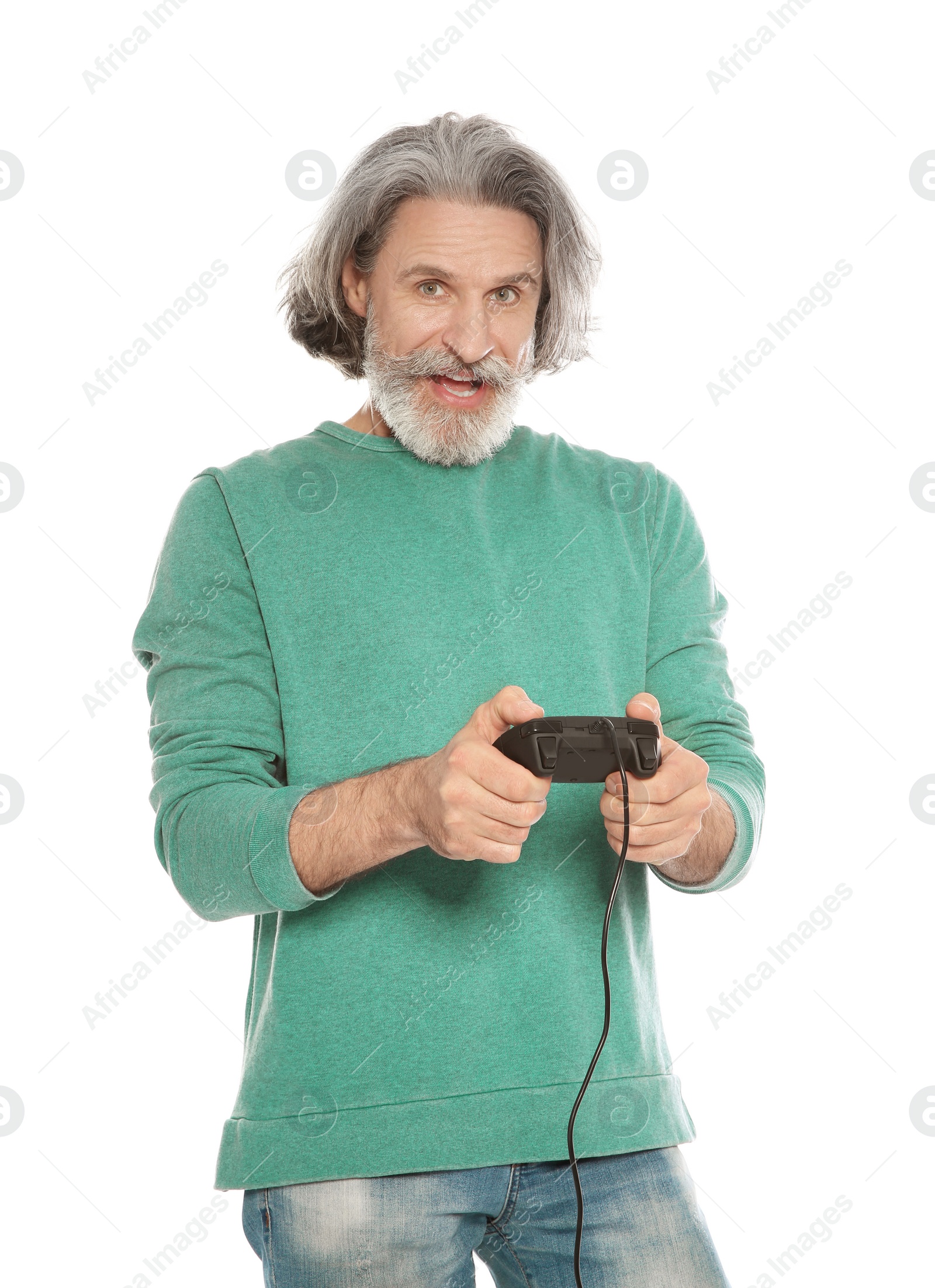 Photo of Emotional mature man playing video games with controller isolated on white