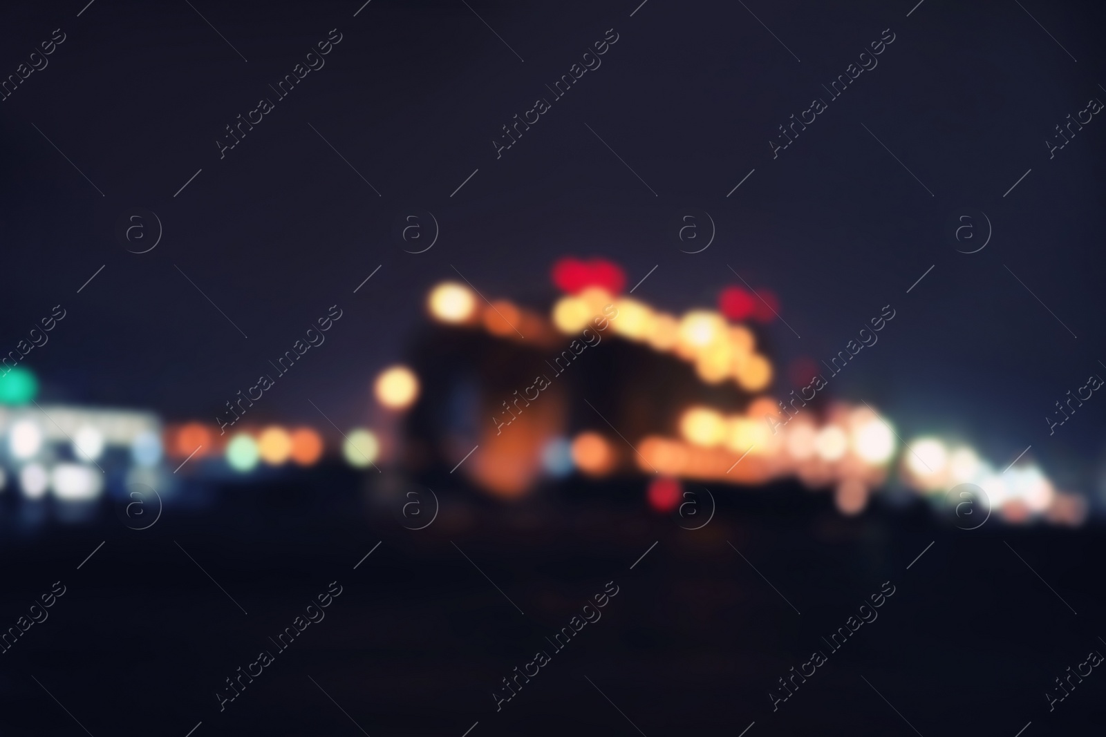 Photo of Blurred view of port at night. Bokeh effect