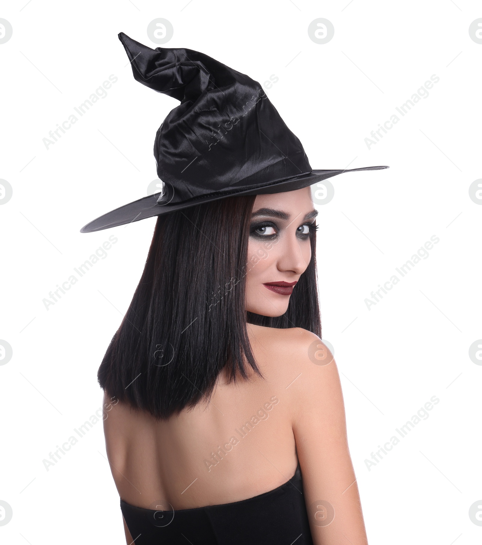 Photo of Mysterious witch wearing hat on white background