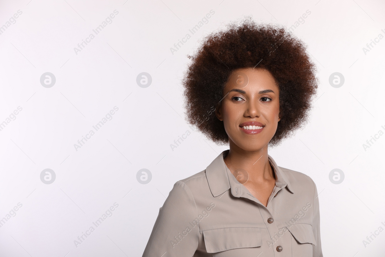 Photo of Portrait of beautiful young woman in stylish blouse on white background. Space for text