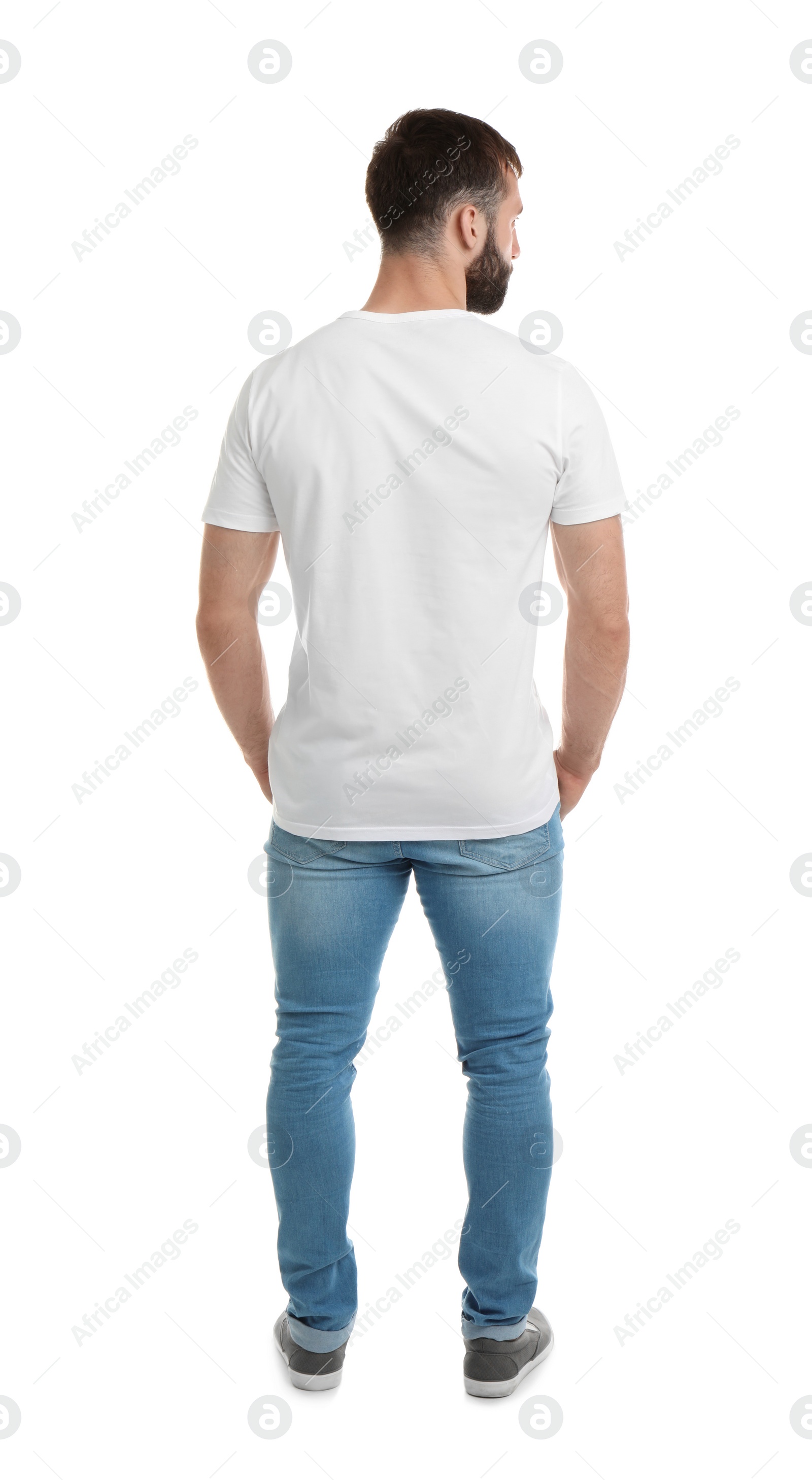 Photo of Young man in t-shirt on white background. Mockup for design