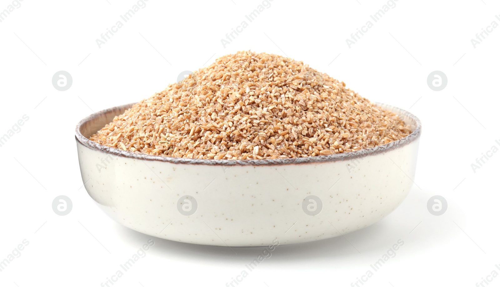 Photo of Dry wheat groats in bowl isolated on white