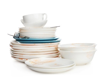 Photo of Pile of dirty kitchenware on white background