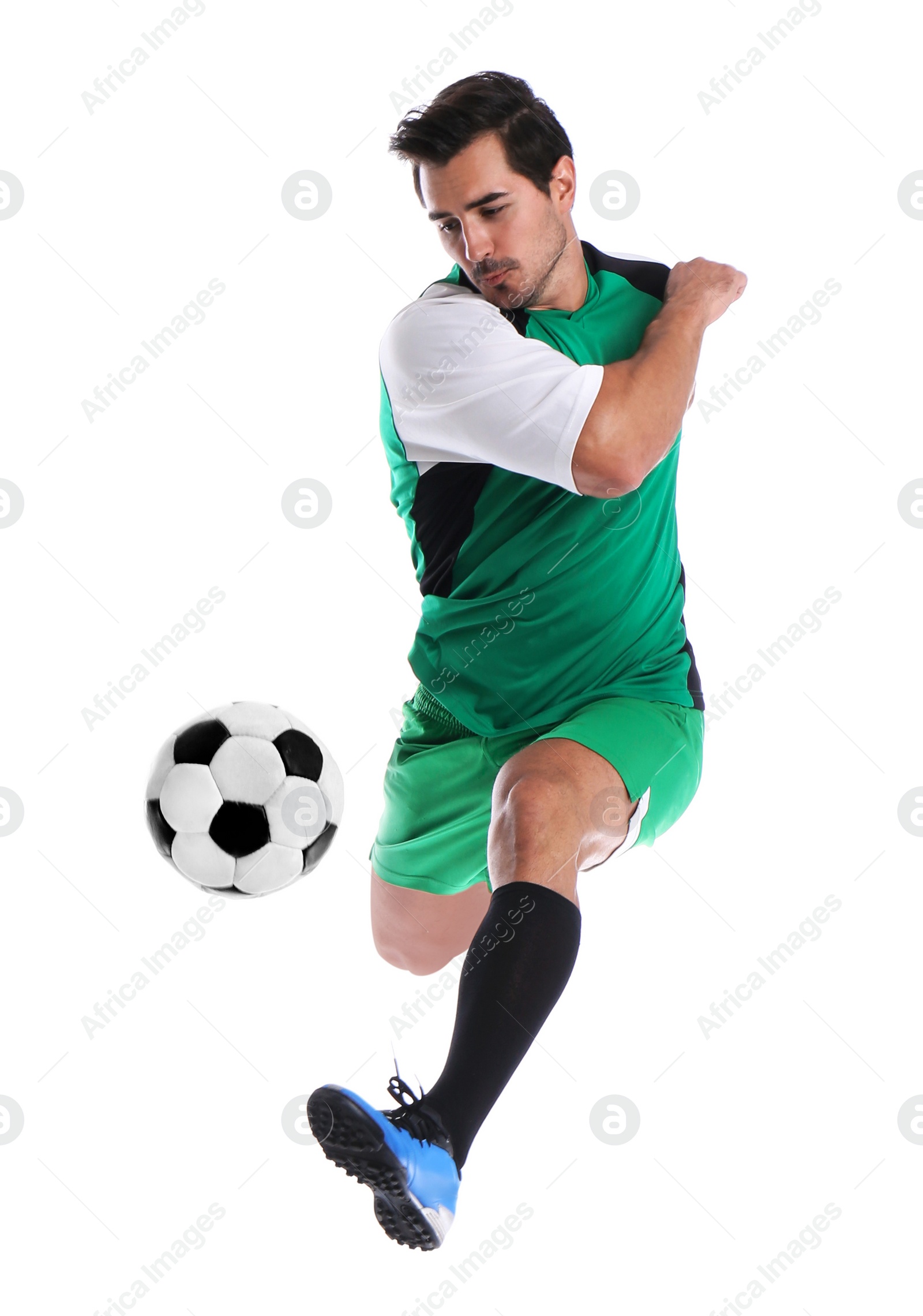 Photo of Young man playing football on white background