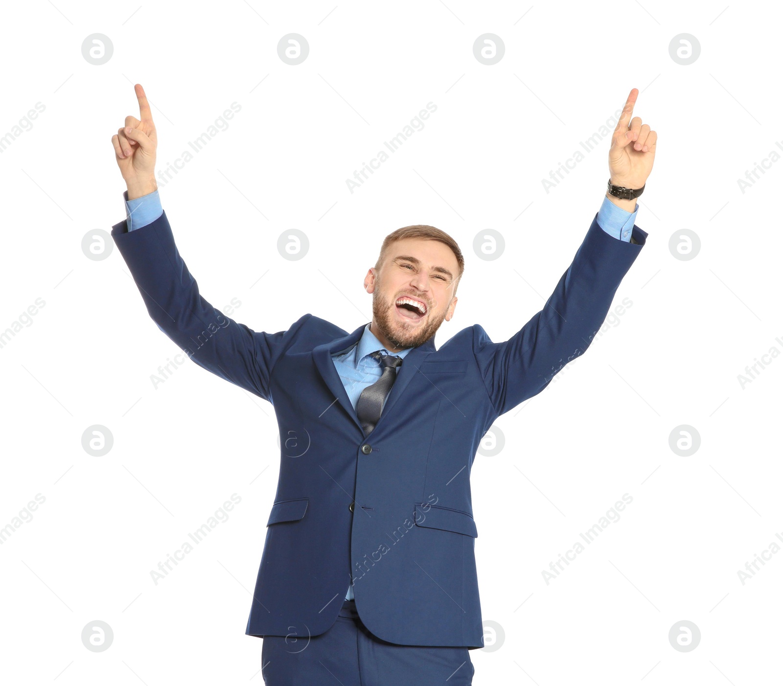 Photo of Young businessman celebrating victory on white background