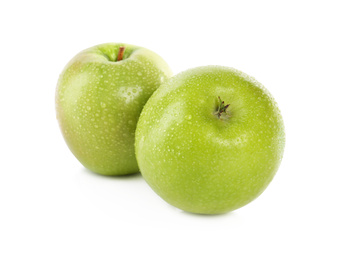 Photo of Fresh juicy green apples with water drops isolated on white