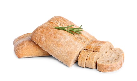 Photo of Cut delicious ciabattas with rosemary on white background