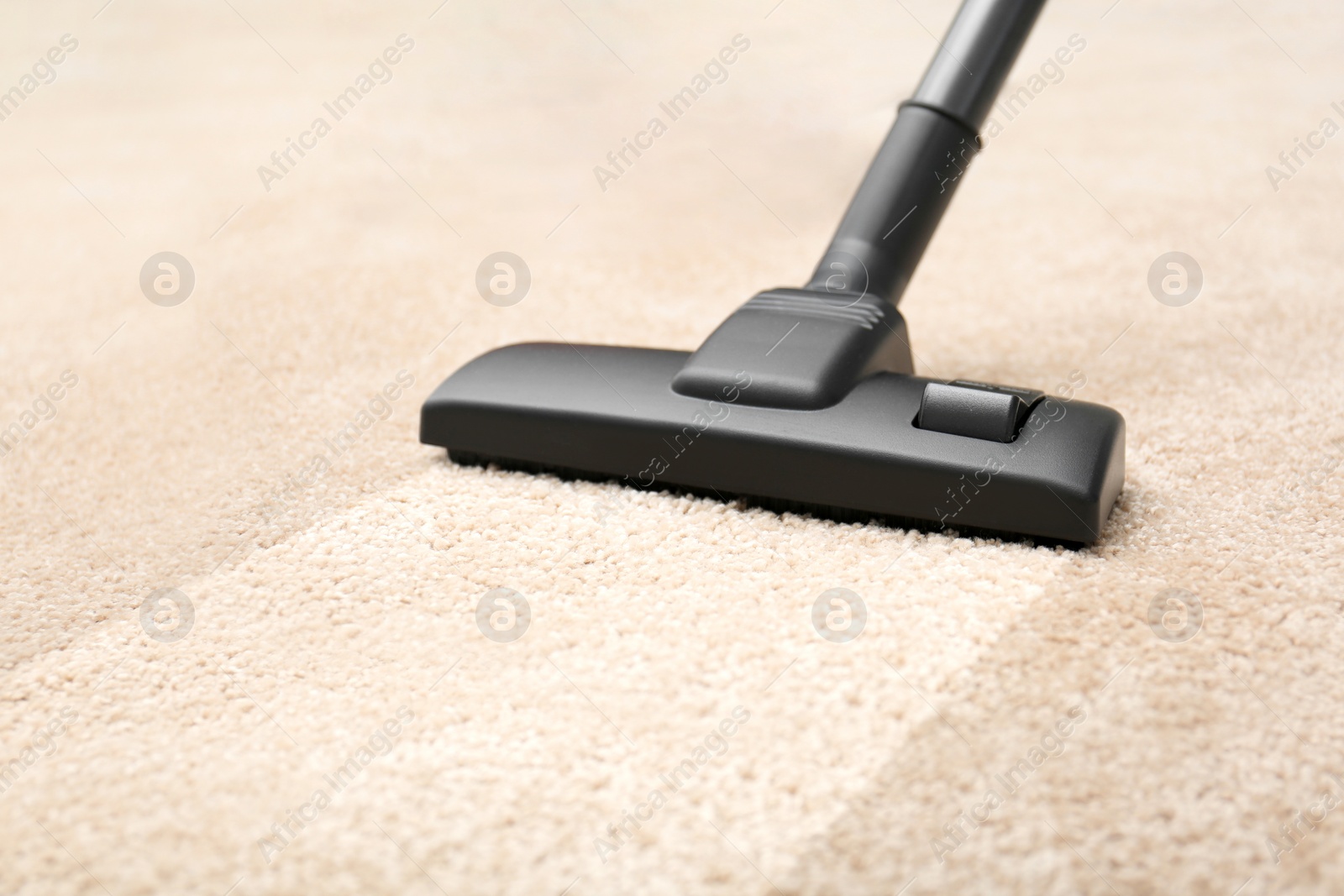 Image of Vacuuming carpet. Clean area after using device, closeup