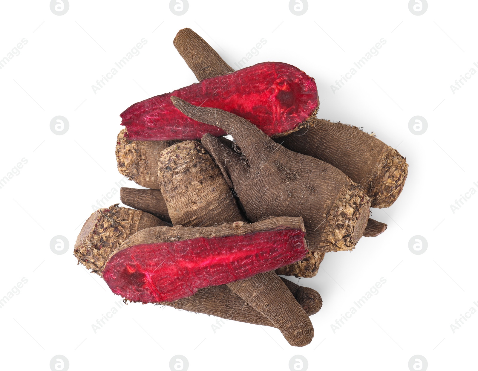 Photo of Whole and cut red beets isolated on white, top view