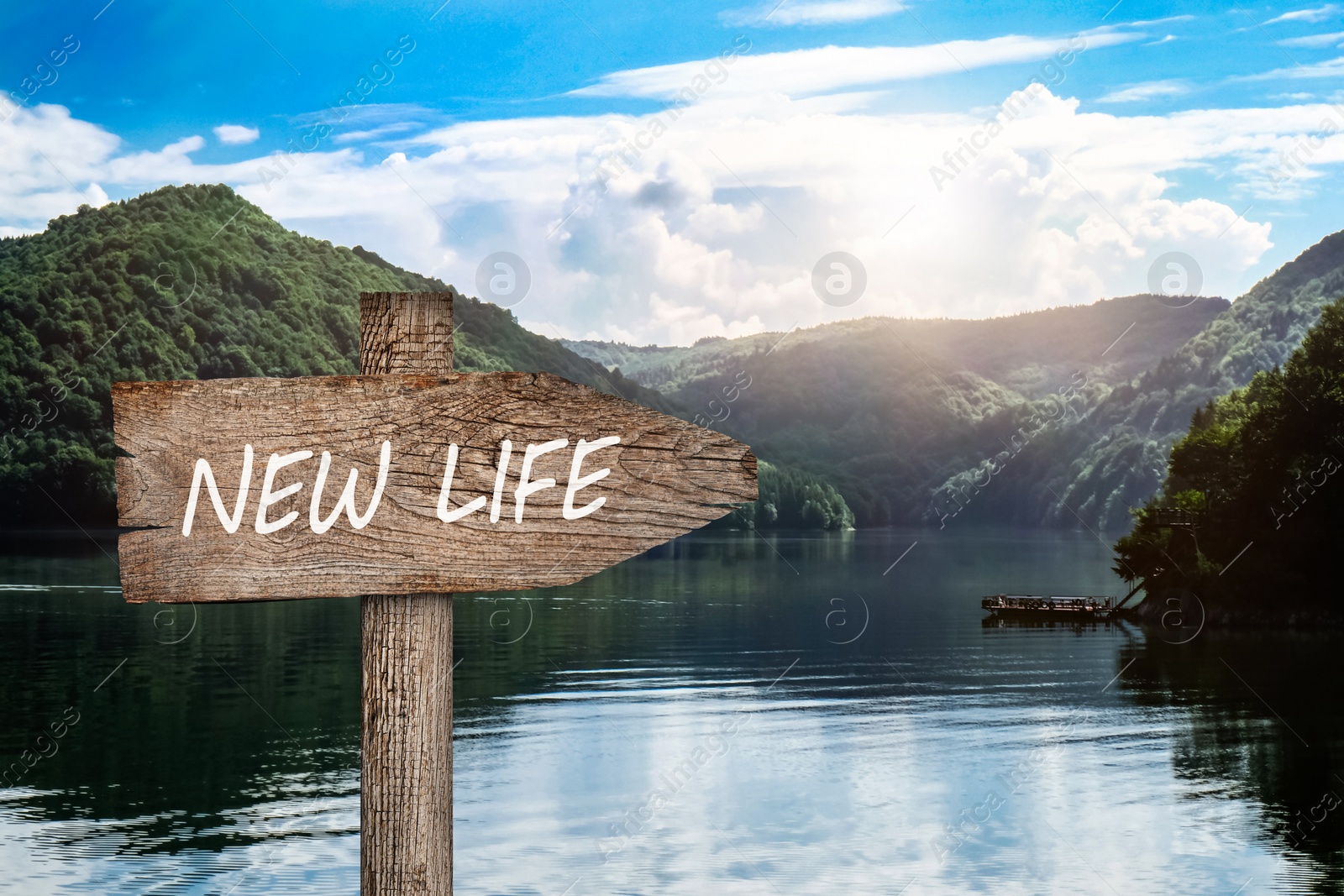 Image of Start to live without alcohol addiction. Wooden signpost with inscription NEW LIFE against beautiful mountain landscape