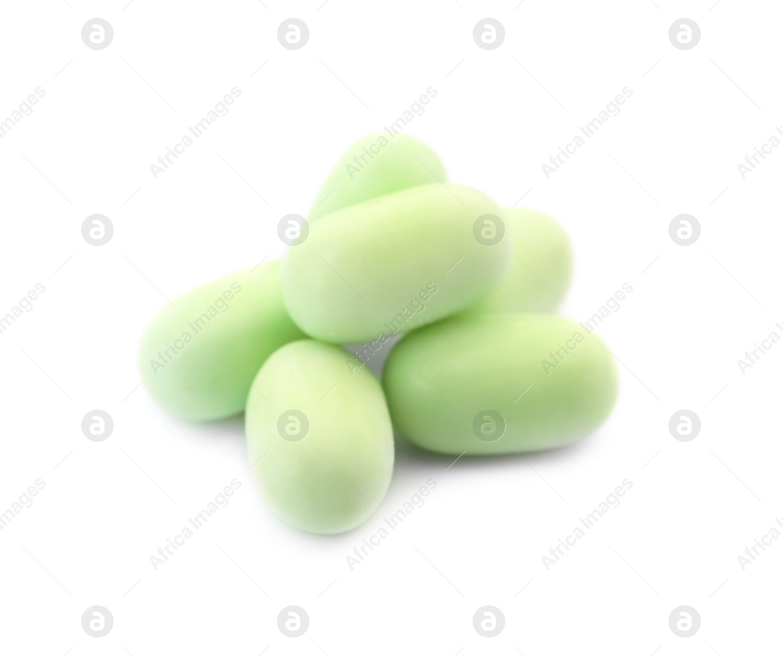 Photo of Tasty mint candies on white background. Delicious confection