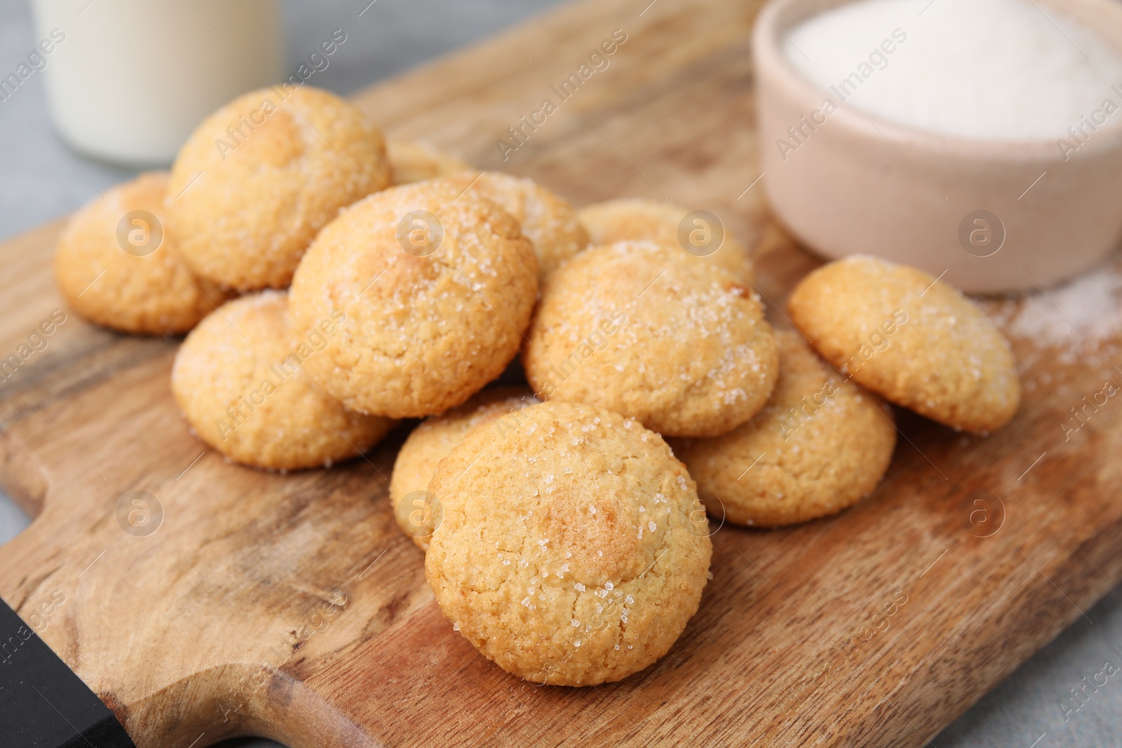 Photo of Tasty fresh sugar cookies on grey table, closeup