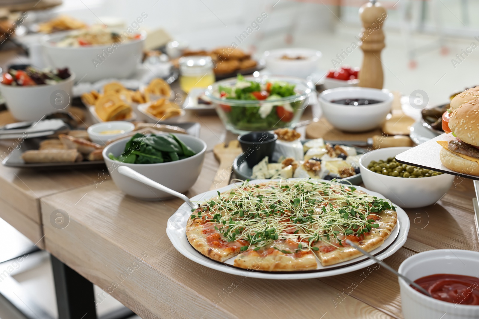 Photo of Brunch table setting with different delicious food indoors