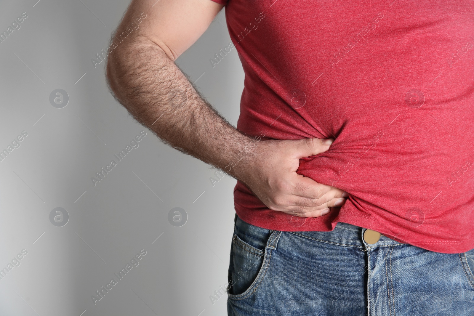 Photo of Overweight man on white background