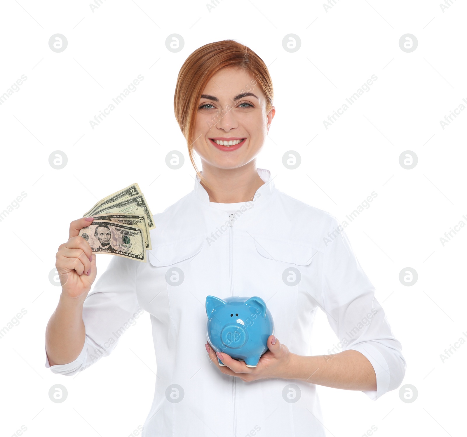 Photo of Portrait of female doctor with piggy bank and money on white background