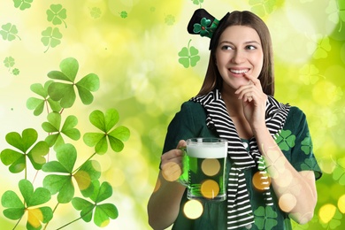 Image of Happy woman in St. Patrick's Day outfit with beer on green background, space for text