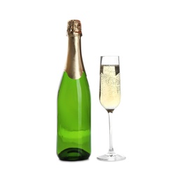 Bottle and glass with champagne on white background. Festive drink