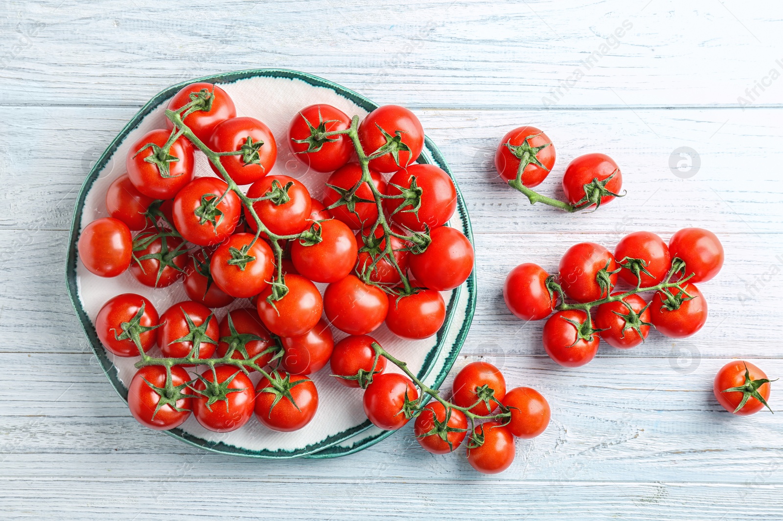 Photo of Flat lay composition with ripe tomatoes on wooden background