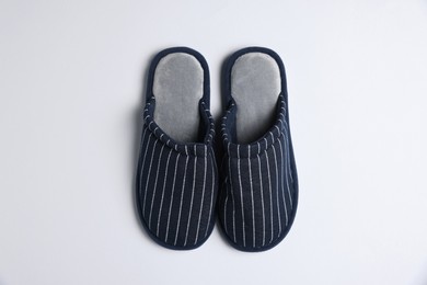 Photo of Pair of stylish slippers on light grey background, top view