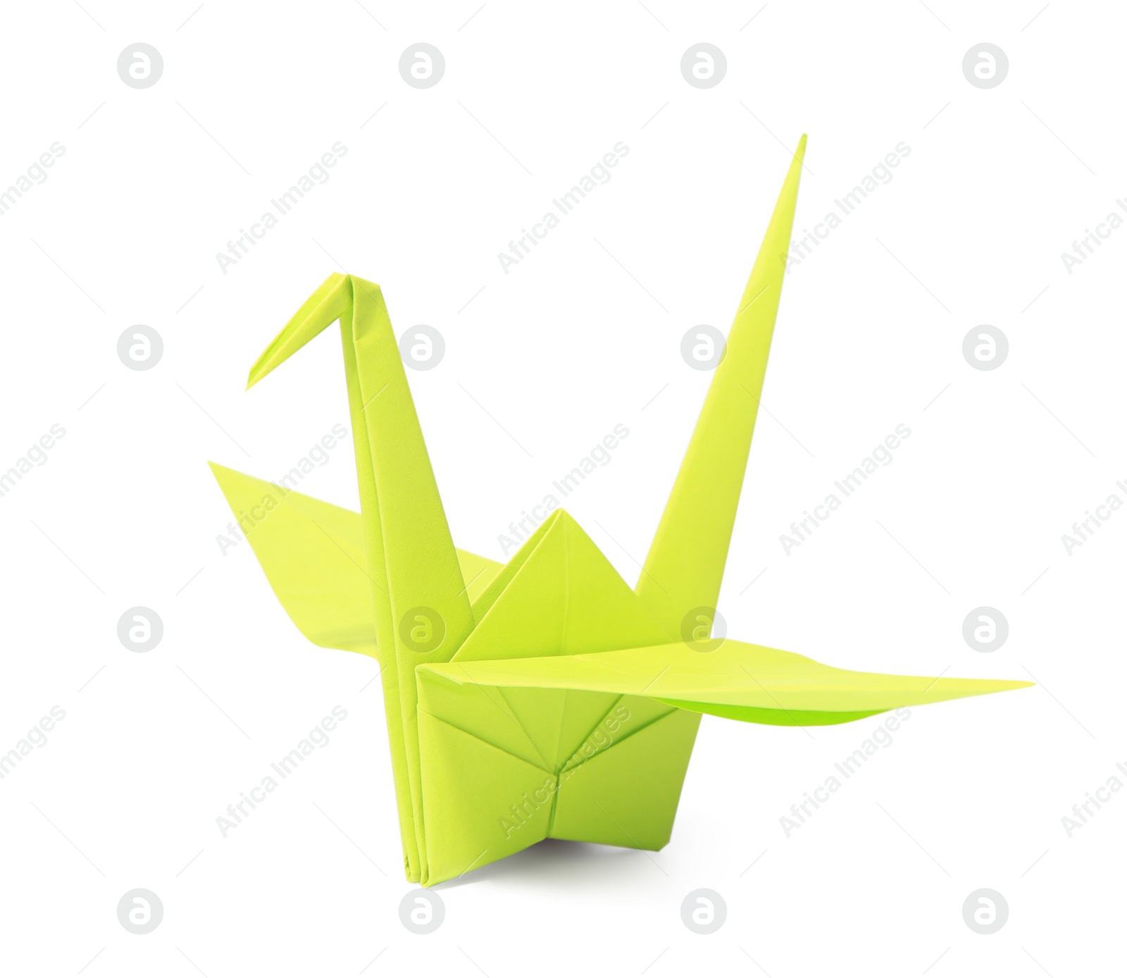 Photo of Origami art. Green handmade paper crane isolated on white