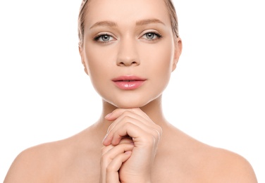 Photo of Portrait of young woman with beautiful face on white background, closeup