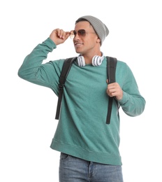 Man with backpack on white background. Autumn travel