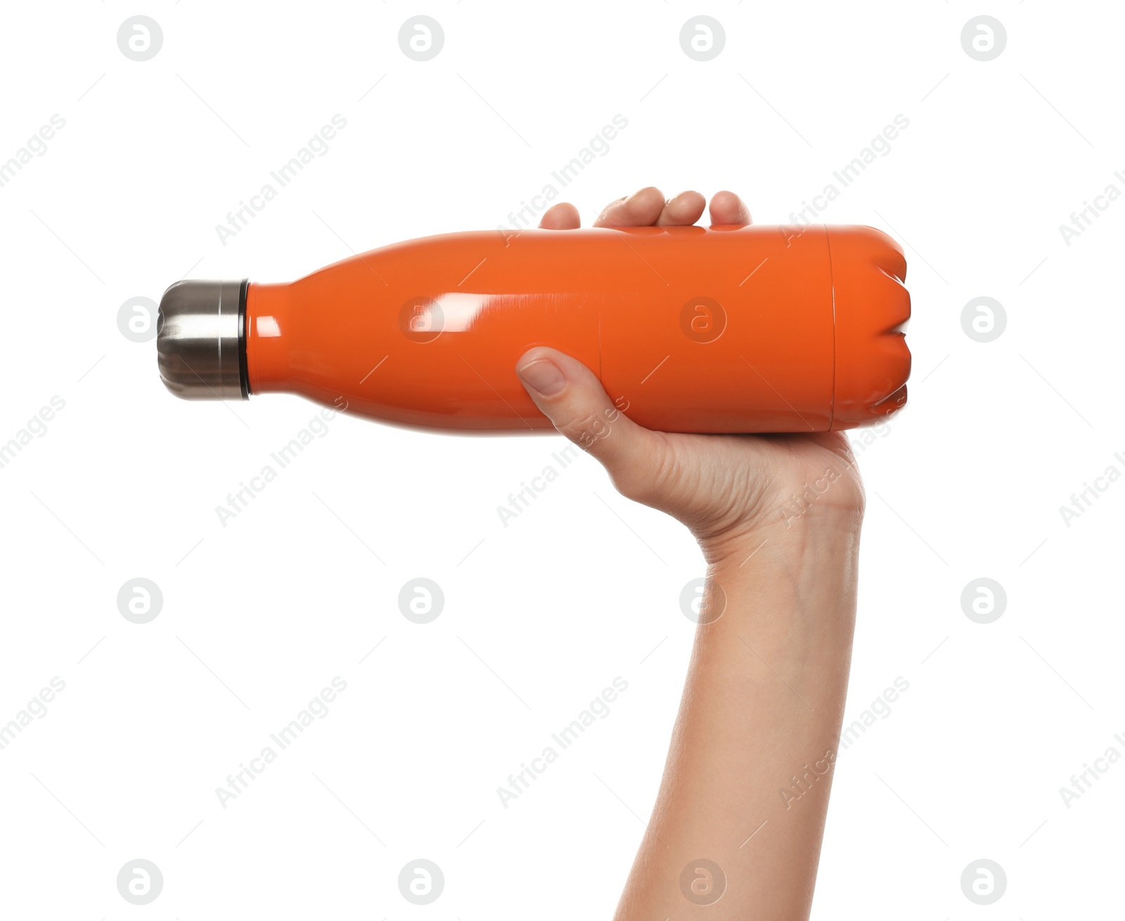 Photo of Woman holding orange thermos bottle on white background, closeup